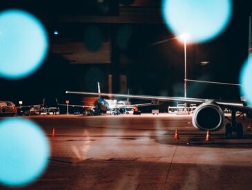 a large jetliner sitting on top of an airport tarmac